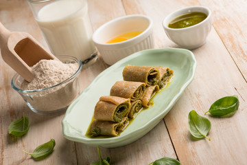 crepes with pesto sauce and ingredients