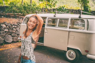 Camper van road trip Asian young woman happy relaxing on summer travel vacation in Hawaii. Retro...