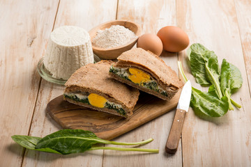 pasqualina pie with egg ricotta and vegetables