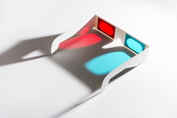 Red and blue 3d glasses on reflective background