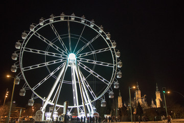 night ferris wheel illuminated with lights