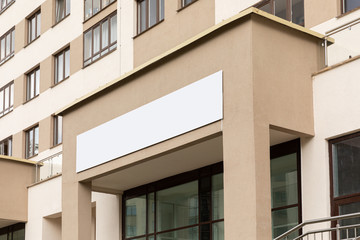 Modern accomodation unit facade with copyspace beyond front door, entry door or wide window