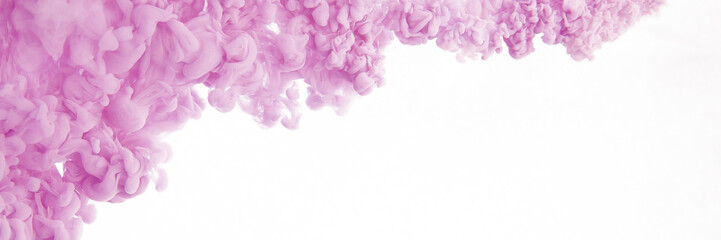 Obraz premium Colorful ink in water isolated on white background. Abstract pink paint splash.