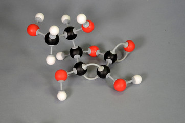 Molecule model of Ascorcic acid or Vitamin C.White is Hydrogen, black is Carbon, red is  Oxygen.