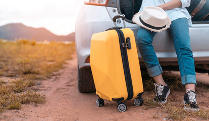 Car travel of woman journey with suitcase open hatchback car at lake river mountain and street in summer vacation road trip on holidays to destination, Traveler transportation people lifestyle