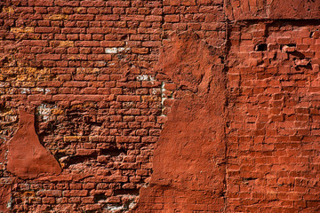 Horizontal shabby old red wall texture