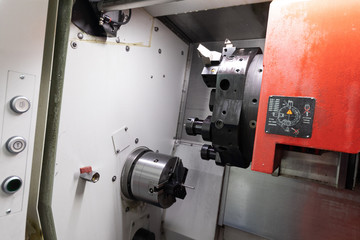 portrait of the working machine in the plant of the metal details