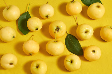 Delicious apples on a yellow background vitamins, proper nutrition.