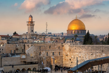 Naklejka premium Western Wall and golden Dome of the Rock at sunset, Jerusalem Old City, Israel.