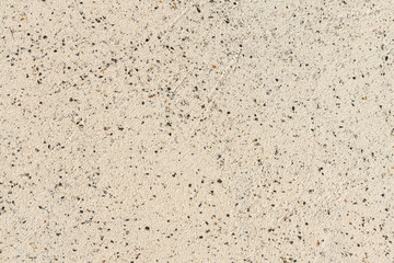 Close-up of seamless texture of light marble granite tiles with dark impregnations, design background
