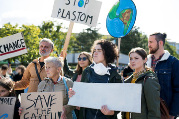People with placards and posters on global strike for climate change.