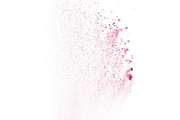 Abstract pink powder explosion on white background. Freeze motion of pink powder splash.