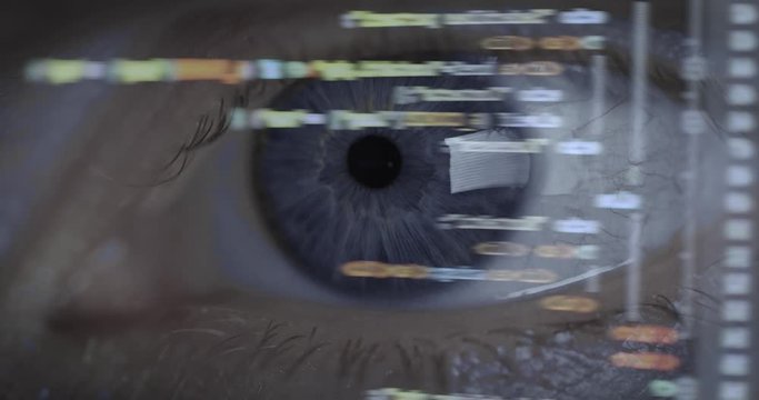 cyberspace - close up of programmer eye with programming code reflection