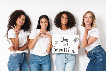 Women multiracial friends holding blank with compliments text.