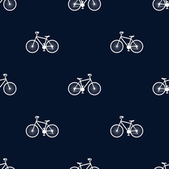 Vector illustration. Seamless pattern with white bikes on blue background.