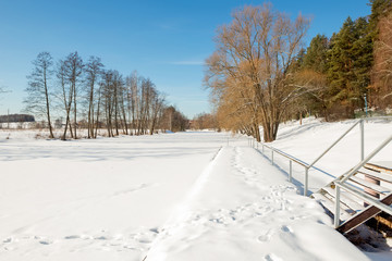 Embankment of the river in the winter afternoon
