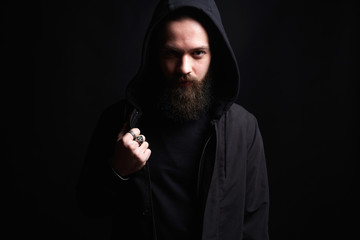 Boy in a hoodie sweatshirt. portrait of bearded man