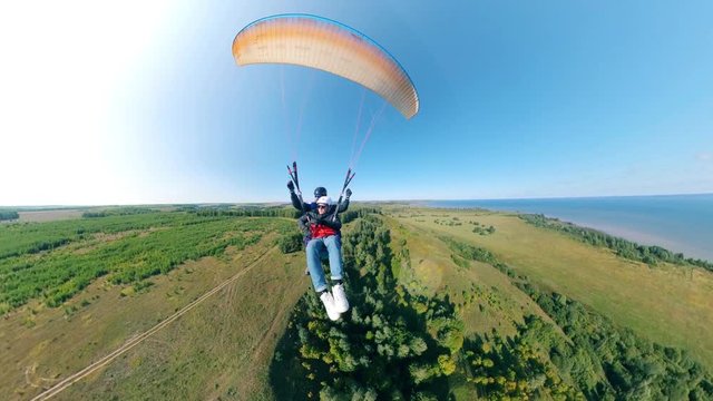 Tandem flight on the parawing over the forest