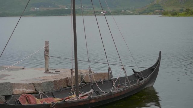 Harbour scene in Norway with Viking boat