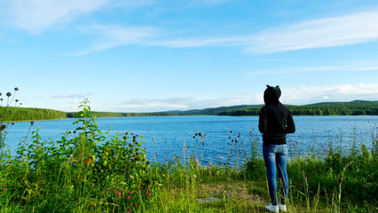 girl looking on the lake