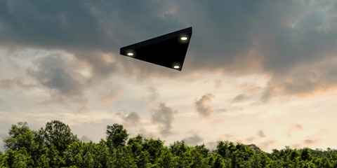 Triangular shaped ufo flying in the sky