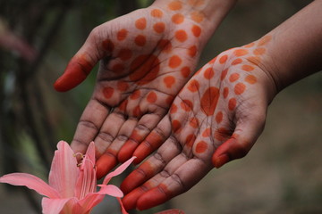 picture of the hand after applied of Natural / herbal or home made henna with some traditional...