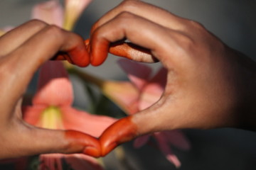 picture of the hand after applied of Natural / herbal or home made henna with some traditional henna design or model