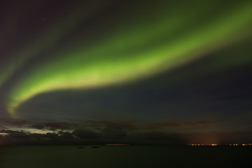 Beautiful northern lights over the Atlantic ocean. Iceland