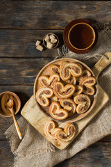 Puff pastry with sugar and cinnamon in a rustic style