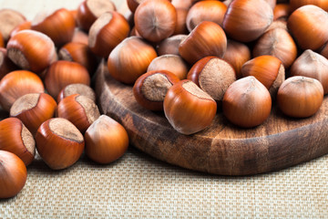 close up of hazelnuts on table .