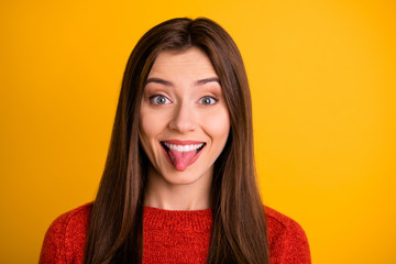 Photo of trendy charming cute nice attractive fascinating girlfriend sticking tongue out smiling...