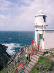 Fototapeta na wymiar Lighthouse at sheeps head in ireland