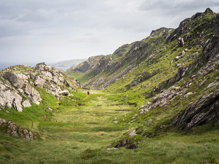 Hiking in a valley at mizen head cliffs in ireland © Ewald Fröch