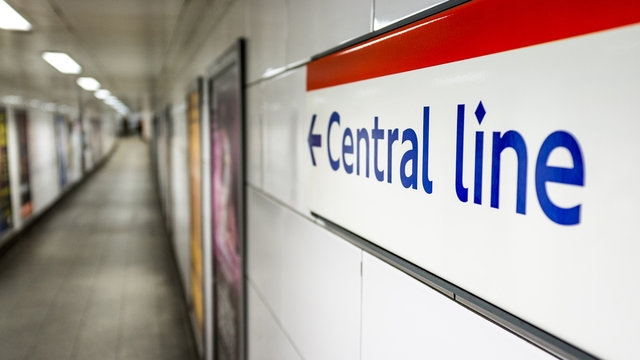 Central Line sign. Direction sign on the wall of a London Underground station pointing travellers in the direction of the red Central Line.