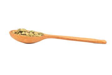 Dry cardamom in spoon
