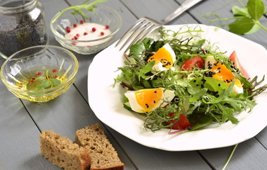 Cucumber, tomato, egg, fresh green salad with black sesame