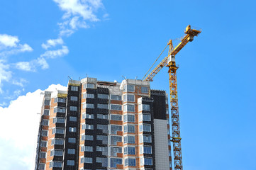 Crane and highrise construction site
