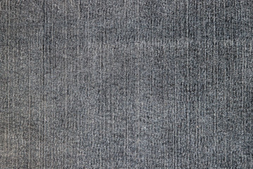 Texture of the inner side of a black denim fabric