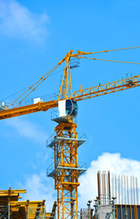 Crane and highrise construction site