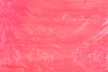 Fototapeta premium Wall surface plastic texture. Abstract background with pink shapes in top view.
