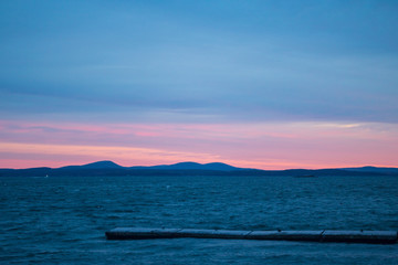 Pale pink sunrise over Frenchman Bay