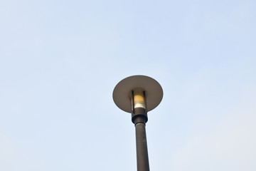 Technology communication tower ,TV Antenna with satellite dish at blue sky background.