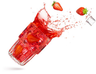 strawberry and ice cube spilling out of a flying cocktail isolated on white