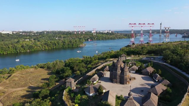Aerial view of Cossack Settlement Zaporizhzhya Sich on the Island of Khortytsya. Moving the camera forward on the subject.