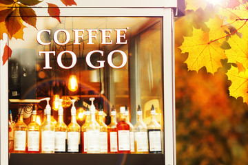 Coffee to go shop in autumn park, bright colors