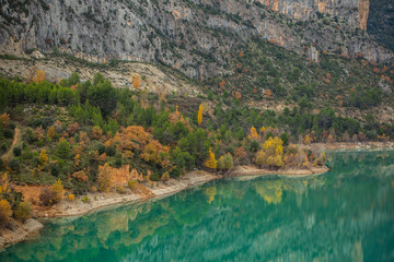 Fototapeta na wymiar Calm lake near mountains in nature