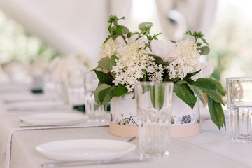 Beautiful wedding bouquets of white fresh flowers and greens