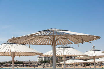 sunshade umbrella on sky background