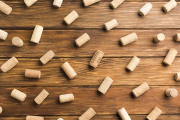 Wooden background full of wine corks