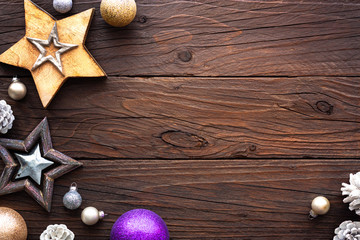 Christmas New Year background decoration on beautiful old vintage rustic dark brown wood texture table board with copy space. Greeting card, invitation, post card, announcement, banner